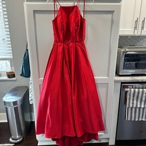 Beautiful red gown. Perfect for prom.